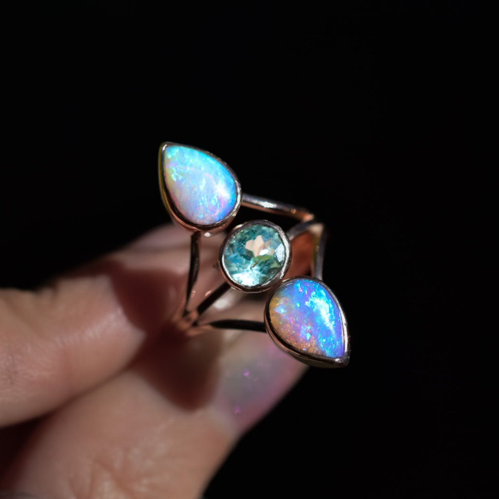 Australian opals and a faceted minty tourmaline “floating “ style three stone ring in solid 14k rose gold - Angel Alchemy Jewelry