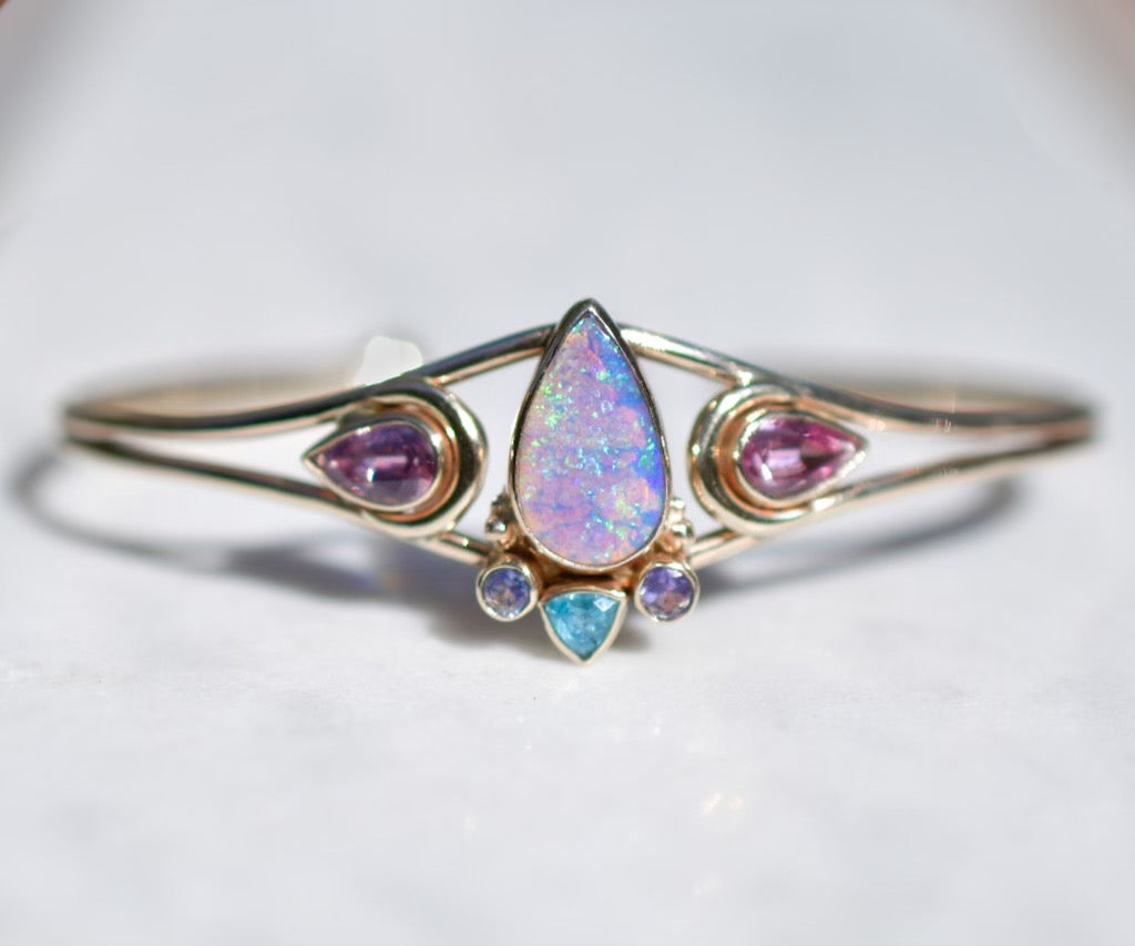 Australian Opal Solid 14 K Yellow Gold cuff bracelet with Paraiba Tourmaline, Pink Spinel and Tanzanite in solid 14k Gold - Angel Alchemy Jewelry
